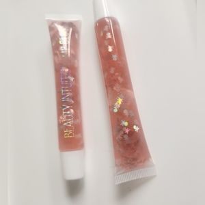 NWT 2× BEAUTY INTUITION TREAT YOURSELF LIP GLOSS WITH SKULL SEQUINS!